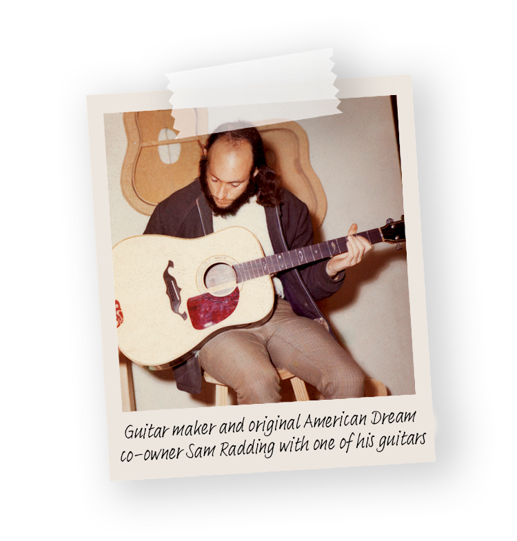 Guitar maker and original American Dream co-owner Sam Radding with one  of his guitars