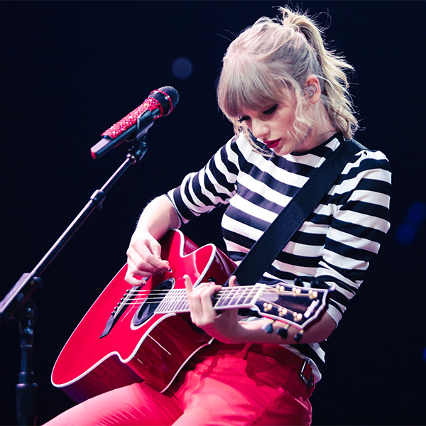 Taylor Guitars Red Guitar Player