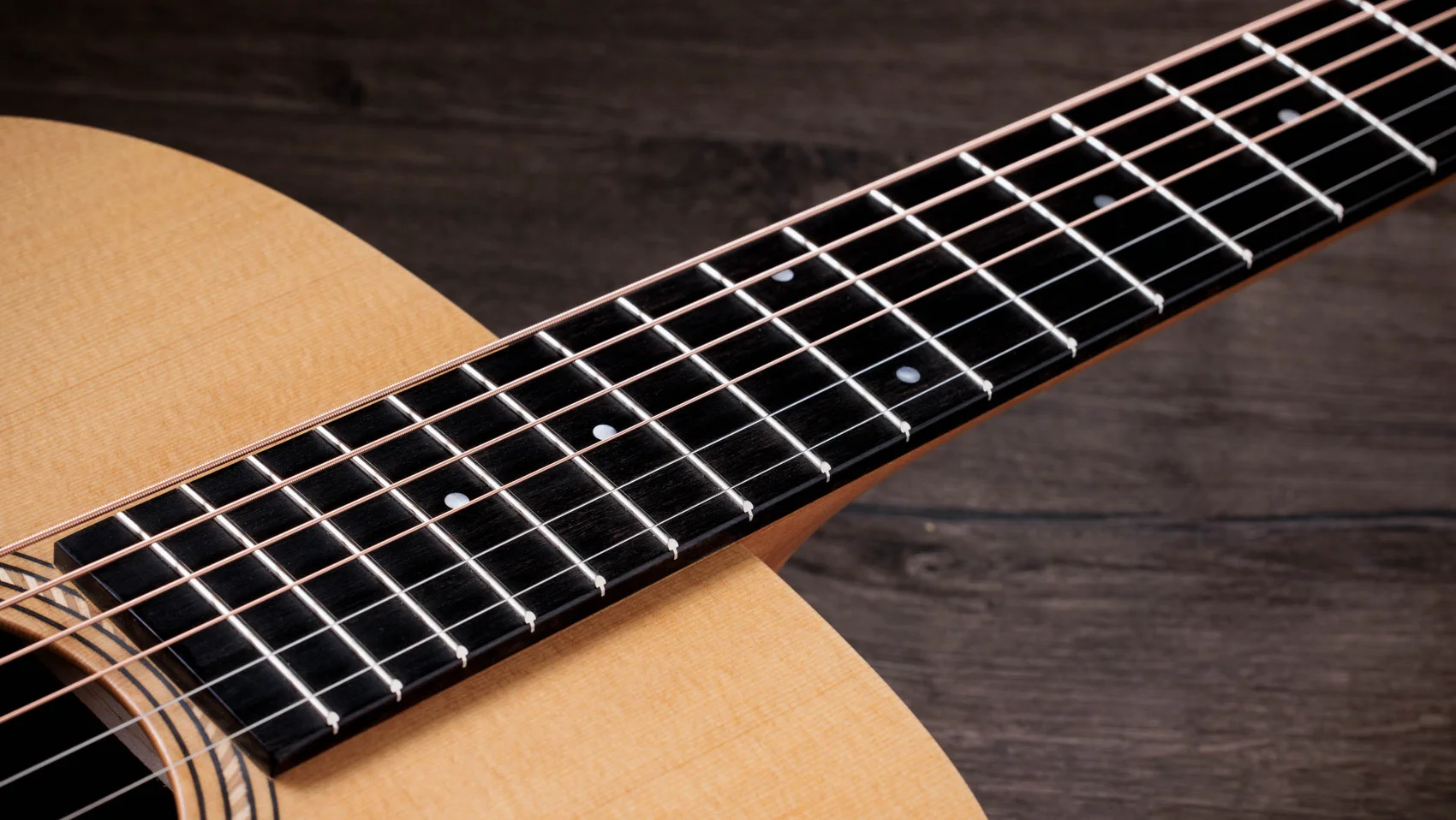 Academy 10e Walnut Acoustic-Electric Guitar | Taylor Guitars
