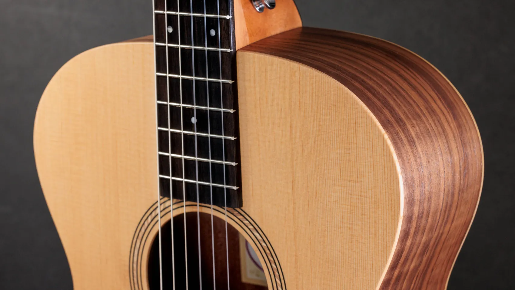 Academy 12e-N Walnut Acoustic-Electric Guitar | Taylor Guitars