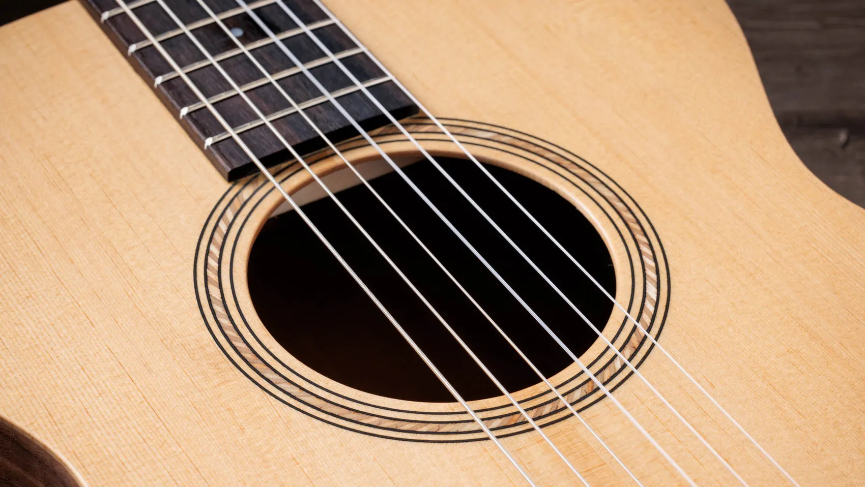 Academy 12e-N Walnut Acoustic-Electric Guitar | Taylor Guitars