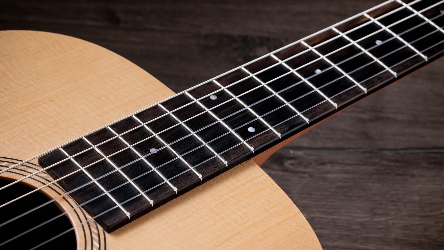 Academy 12e-N Walnut Acoustic-Electric Guitar | Taylor Guitars