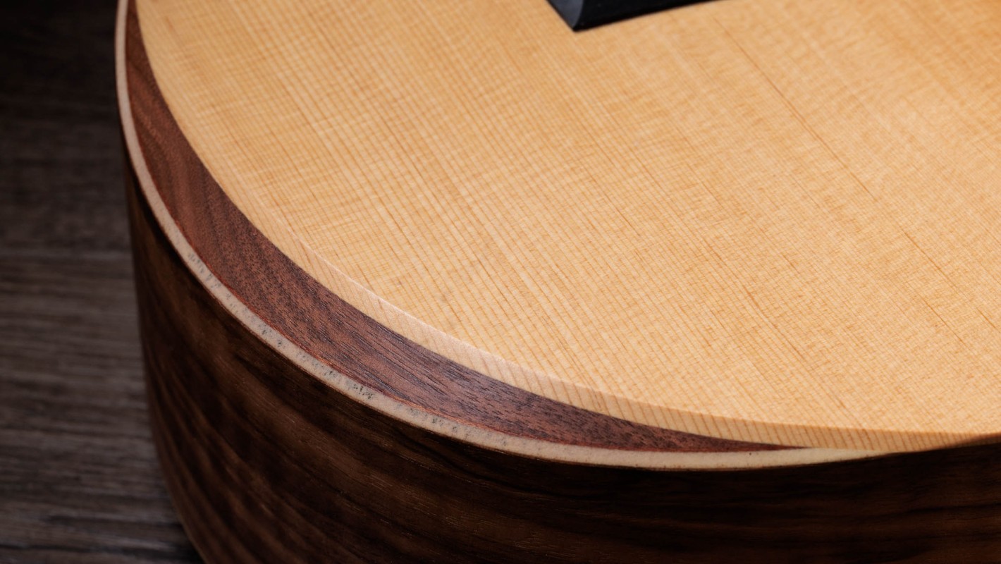 Academy 12e-N Walnut Acoustic-Electric Guitar | Taylor Guitars