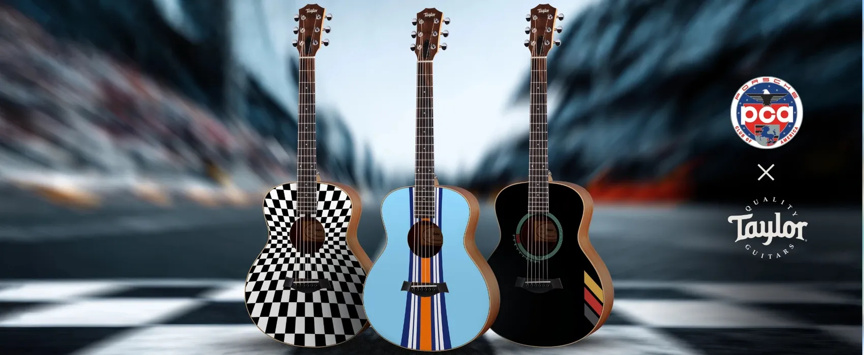 Three Taylor guitars in Porsche Club of America designs on a racetrack, with the PCA and Taylor logos