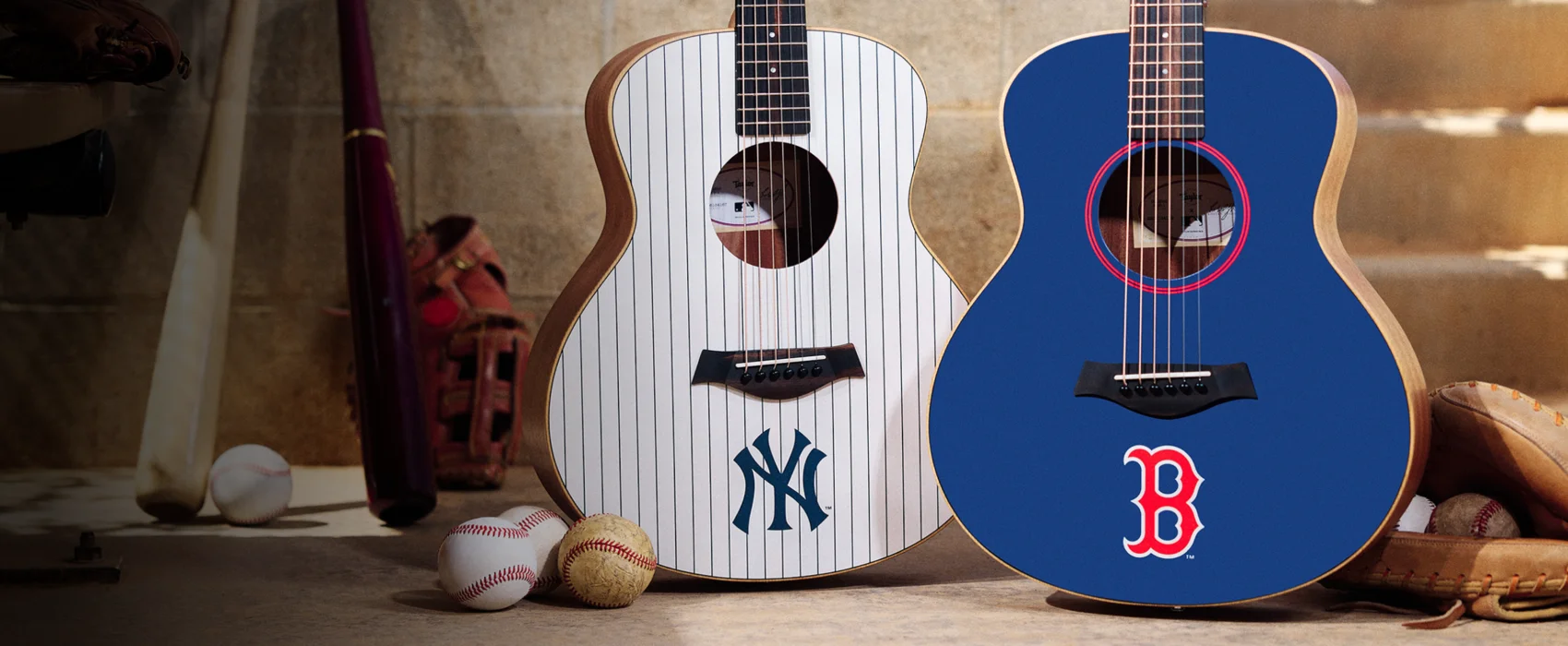 image showing a NY Yankee's Guitar and a Boston Red Sox guitar