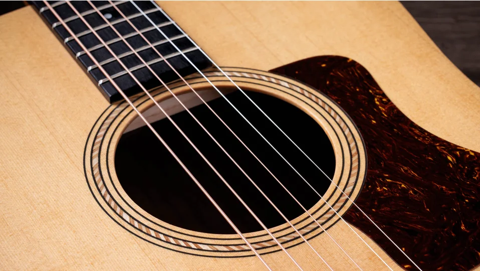 Academy 10e Walnut Acoustic-Electric Guitar | Taylor Guitars