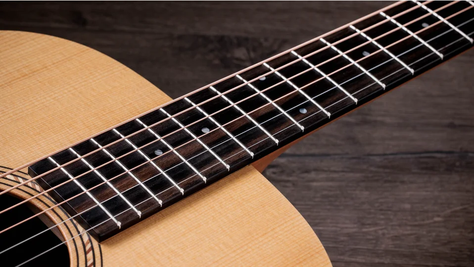 Academy 12e Walnut Acoustic-Electric Guitar | Taylor Guitars